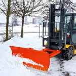 lame de déneigement professionnelle en action