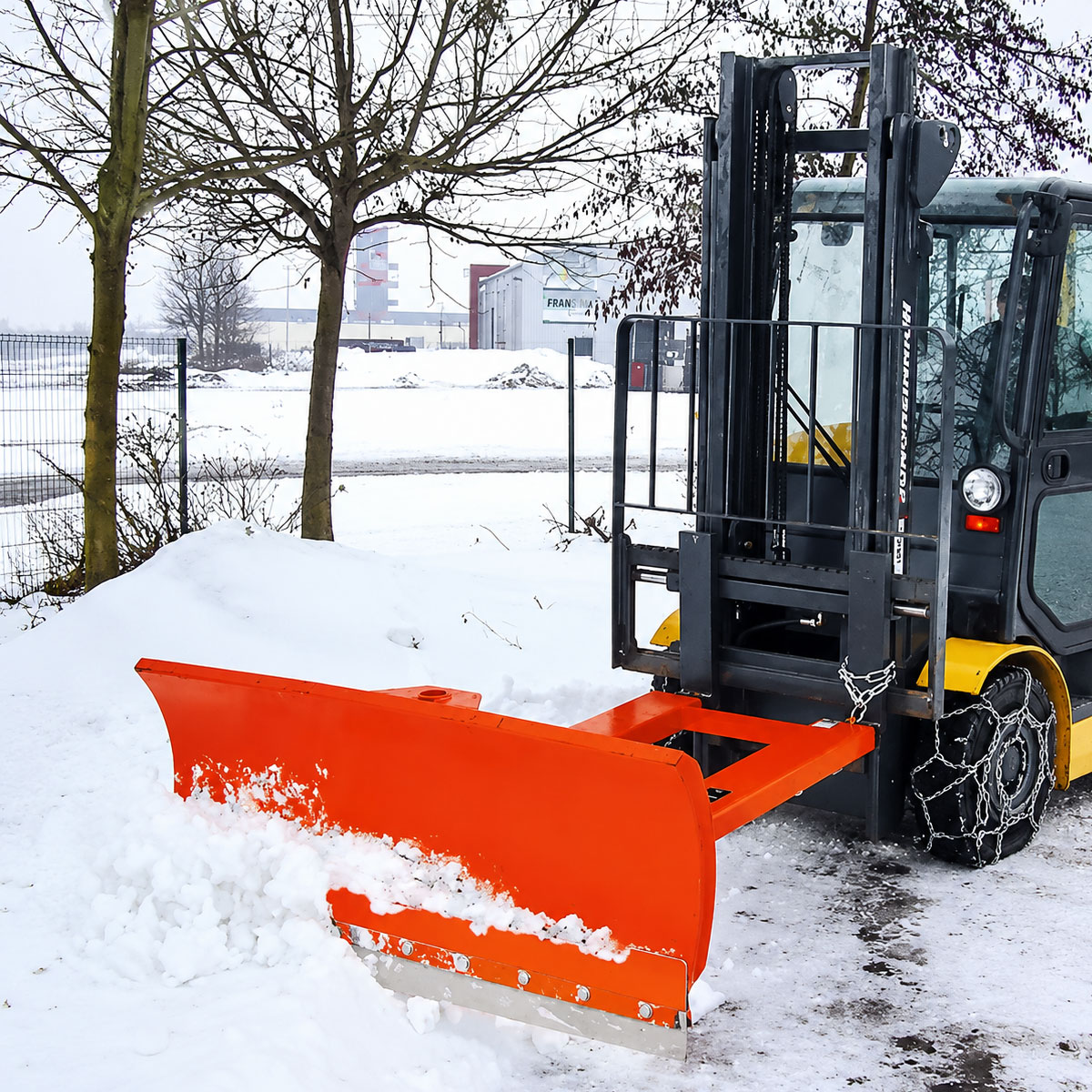 lame de déneigement professionnelle en action